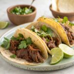 Delicious birria tacos with crispy tortillas, slow-cooked beef, and flavorful consommé