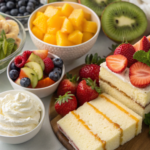 Fresh ingredients for trifle recipes, including fruits, cake, and creams.