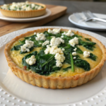 Delicious Spinach and Feta Quiche served on a plate.