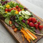 Homemade spring salad mix with fresh greens, colorful vegetables, and vibrant fruits.