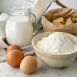 Ingredients for buttermilk pancake recipe including flour, eggs, buttermilk, and sugar.